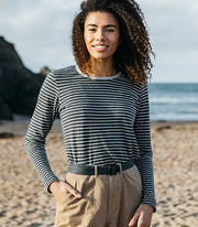 Woman wearing a classic long-sleeve stripey tee from Finisterre made from premium organic cotton