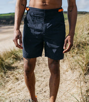 Men's navy recycled swim shorts made from durable, quick drying fabric, with side adjusters and water release pockets